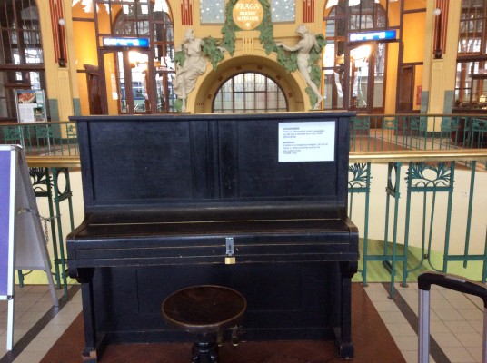 A piano is a dangerous weapon at Prague train station - zoom in for full warning. 